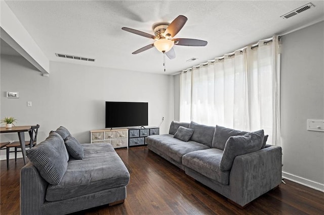 1304 6th Ave, Leavenworth, KS 66048 - living room featuring a ceiling fan and wood finished floors