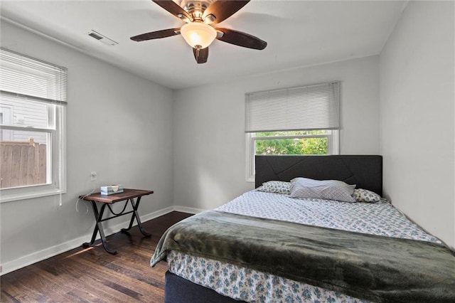 1304 6th Ave, Leavenworth, KS 66048 - bedroom featuring dark wood-style flooring and a ceiling fan