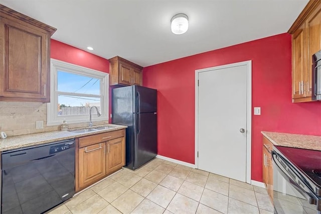 2504 NE 60th St, Gladstone, MO 64118 - kitchen with black appliances, a sink, light tile patterned floors, backsplash, and baseboards