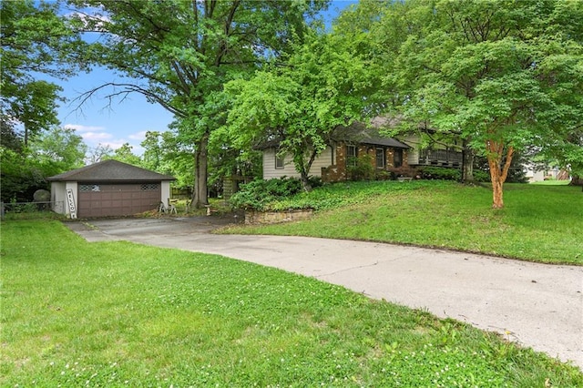 1131 Wildwood St, Leavenworth, KS 66048 - view of front of property with a front yard and a detached garage