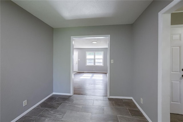 9203 James A Reed Rd, Kansas City, MO 64138 - corridor featuring baseboards