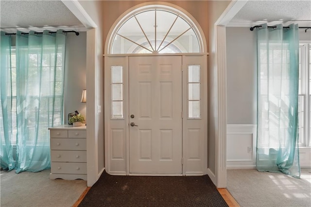 11580 S Skyview Ln, Olathe, KS 66061 - entrance foyer with a textured ceiling and carpet floors