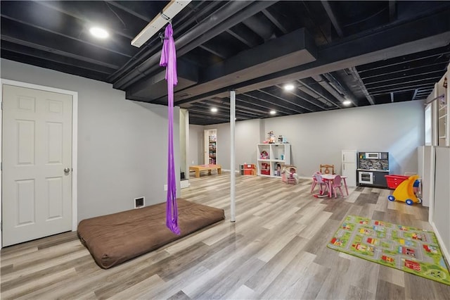 11580 S Skyview Ln, Olathe, KS 66061 - finished basement featuring wood finished floors