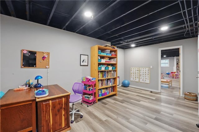 11580 S Skyview Ln, Olathe, KS 66061 - home office featuring light wood-type flooring and baseboards