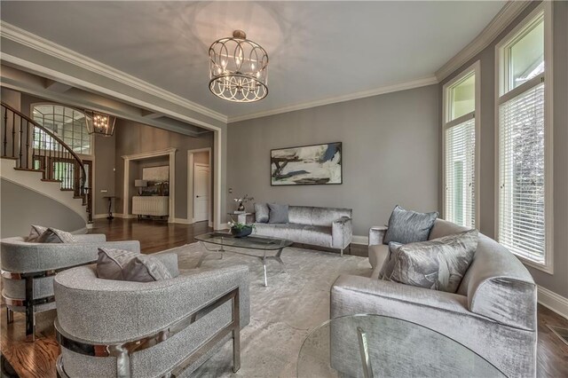 14606 Granada Rd, Leawood, KS 66224 - living room with a chandelier, stairs, baseboards, ornamental molding, and wood finished floors