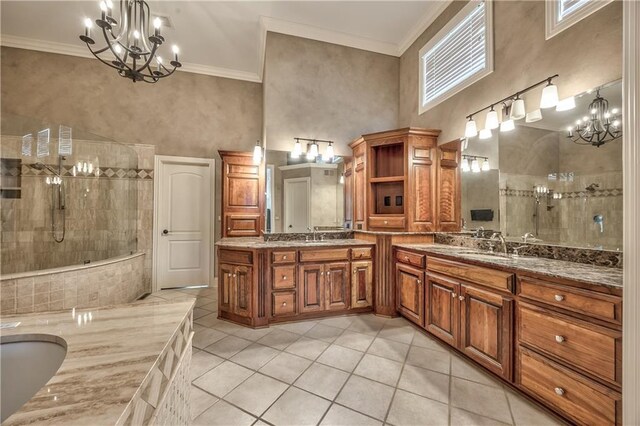 14606 Granada Rd, Leawood, KS 66224 - full bath with a chandelier, tile patterned flooring, double vanity, a tile shower, and crown molding
