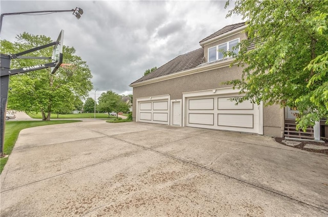 14606 Granada Rd, Leawood, KS 66224 - garage featuring driveway
