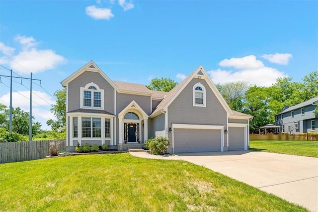 12890 S Greenwood St, Olathe, KS 66062 - traditional home featuring concrete driveway and an attached garage