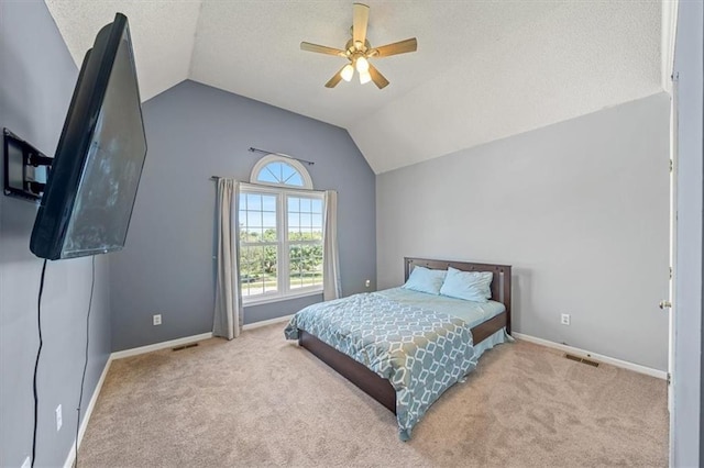12890 S Greenwood St, Olathe, KS 66062 - bedroom with vaulted ceiling, carpet, baseboards, ceiling fan, and a textured ceiling