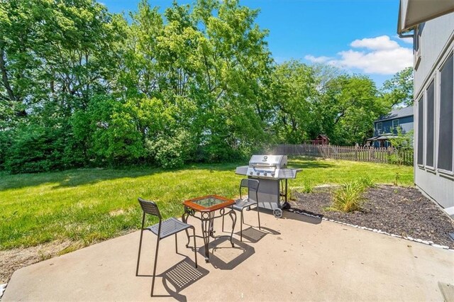 12890 S Greenwood St, Olathe, KS 66062 - view of patio / terrace featuring grilling area and view of wooded area