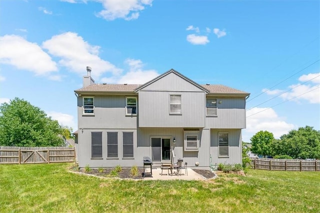 12890 S Greenwood St, Olathe, KS 66062 - back of property featuring a patio area and a chimney