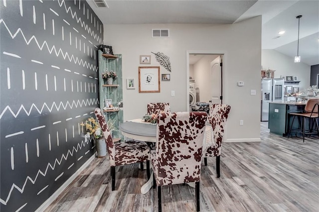 1609 Bluestem Dr, Ottawa, KS 66067 - dining area with wood finished floors and baseboards