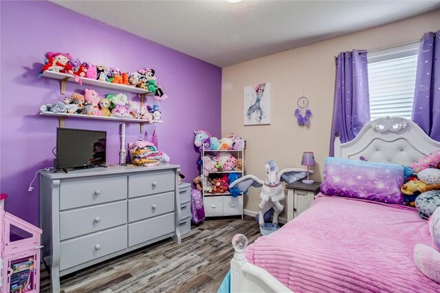 1609 Bluestem Dr, Ottawa, KS 66067 - bedroom featuring wood finished floors