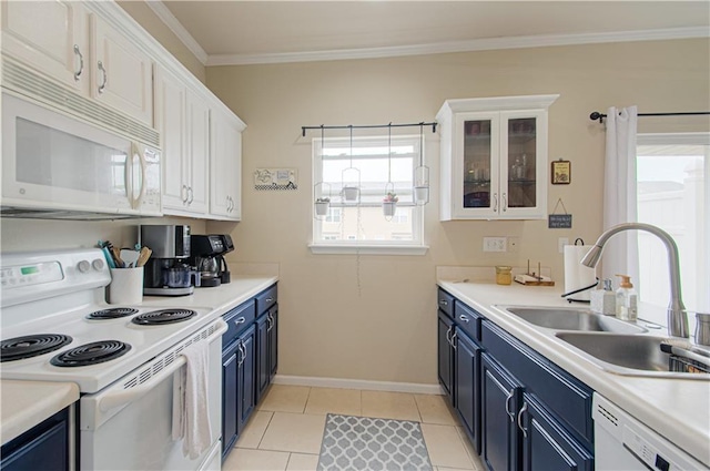 217 N 6th Ter, Louisburg, KS 66053 - kitchen with white appliances, blue cabinetry, a sink, white cabinetry, and crown molding