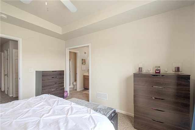 217 N 6th Ter, Louisburg, KS 66053 - bedroom featuring light colored carpet, baseboards, and ensuite bathroom