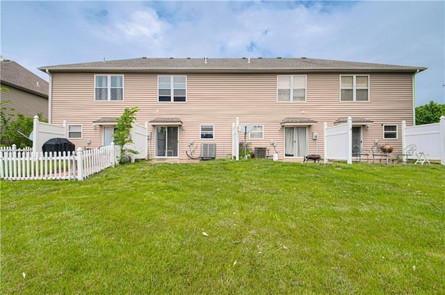 217 N 6th Ter, Louisburg, KS 66053 - rear view of house featuring central air condition unit