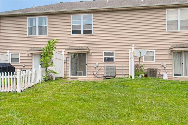 217 N 6th Ter, Louisburg, KS 66053 - rear view of house featuring central AC unit