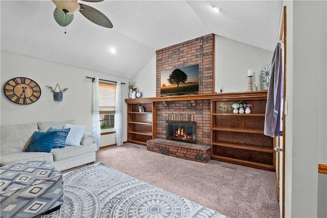 1805 N Lazy Branch Rd, Independence, MO 64058 - carpeted living area featuring lofted ceiling, a fireplace, a ceiling fan, and baseboards