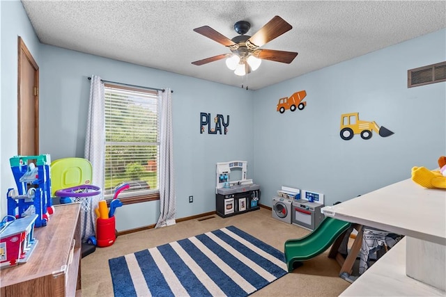 1805 N Lazy Branch Rd, Independence, MO 64058 - playroom featuring carpet floors, ceiling fan, baseboards, and a textured ceiling
