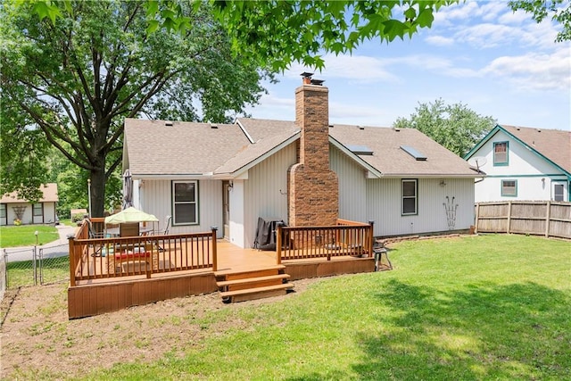 1805 N Lazy Branch Rd, Independence, MO 64058 - back of house featuring a chimney, a deck, and roof with shingles