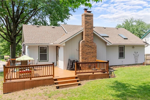 1805 N Lazy Branch Rd, Independence, MO 64058 - back of property featuring a chimney, roof with shingles, and a wooden deck