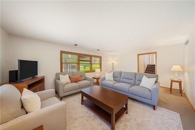 1107 E 110th St, Kansas City, MO 64131 - living room featuring light carpet