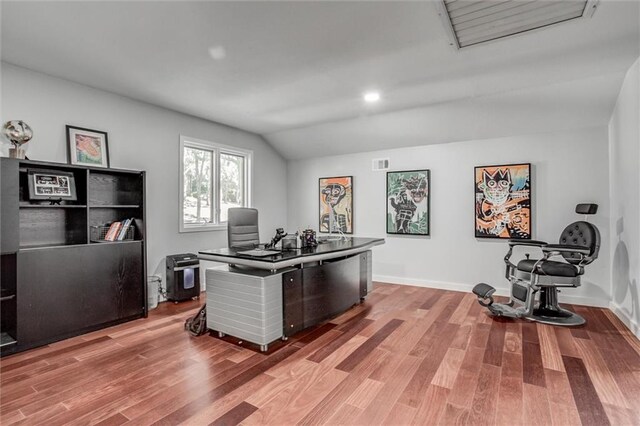 12204 Catalina St, Leawood, KS 66209 - office space featuring wood finished floors, vaulted ceiling, and recessed lighting