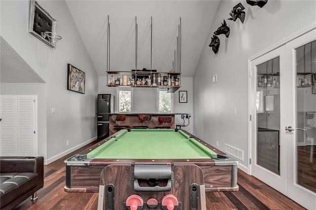 12204 Catalina St, Leawood, KS 66209 - rec room featuring dark wood finished floors, billiards, a bar, high vaulted ceiling, and french doors