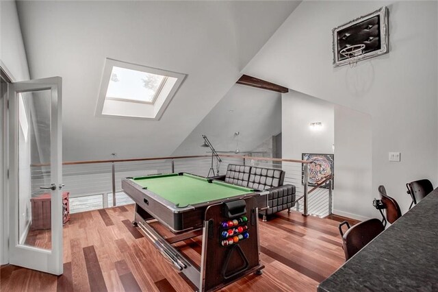 12204 Catalina St, Leawood, KS 66209 - rec room with a skylight, billiards table, wood finished floors, and vaulted ceiling