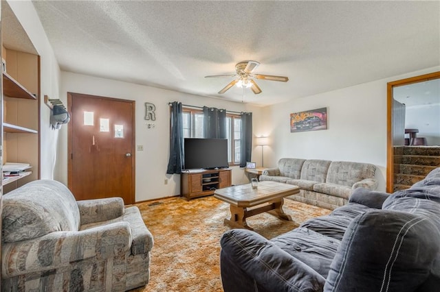 711 S Colby St, Hamilton, MO 64644 - living area featuring a ceiling fan, light carpet, and a textured ceiling