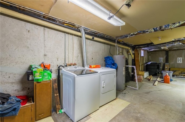 711 S Colby St, Hamilton, MO 64644 - unfinished below grade area featuring independent washer and dryer and water heater