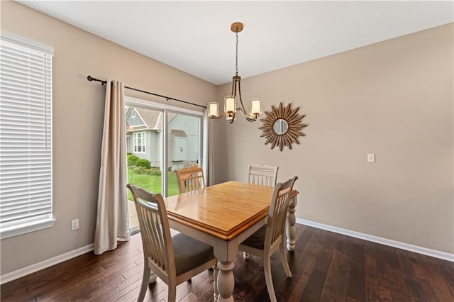 20740 W 224th St, Spring Hill, KS 66083 - dining room featuring a chandelier and dark wood-type flooring