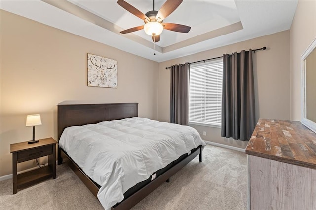 20740 W 224th St, Spring Hill, KS 66083 - bedroom with light colored carpet, a raised ceiling, and a ceiling fan
