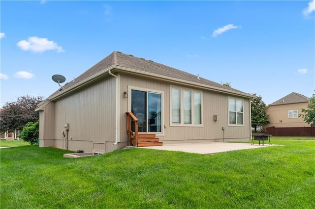 20740 W 224th St, Spring Hill, KS 66083 - back of house featuring entry steps, a patio, a lawn, and a shingled roof