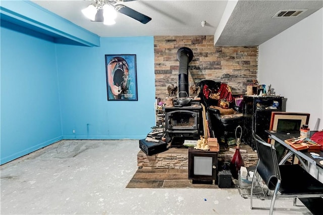 19490 Countryside Cir, Weston, MO 64098 - office space featuring a wood stove and ceiling fan