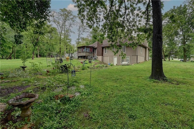 19490 Countryside Cir, Weston, MO 64098 - view of grassy yard featuring a deck