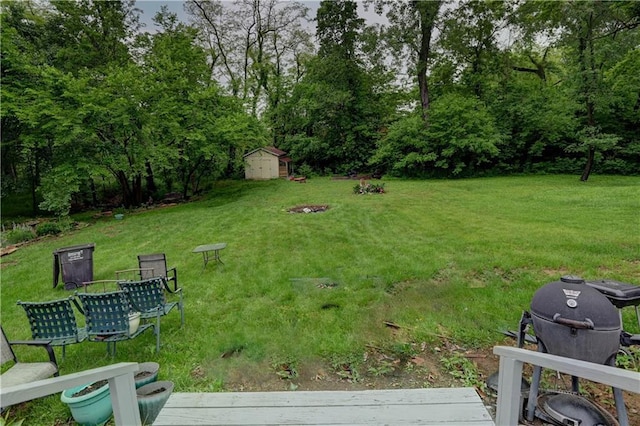19490 Countryside Cir, Weston, MO 64098 - view of grassy yard with view of wooded area