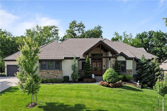 11106 W 146th Ter, Overland Park, KS 66221 - tudor-style house featuring french doors, stone siding, and stucco siding