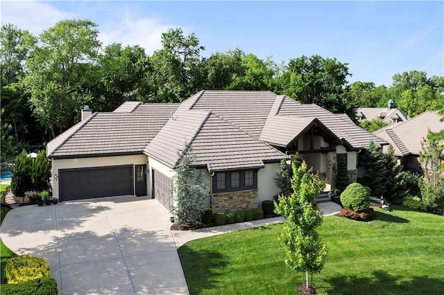 11106 W 146th Ter, Overland Park, KS 66221 - view of front facade featuring stone siding, stucco siding, concrete driveway, and a tile roof