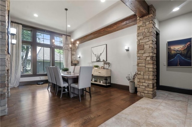 11106 W 146th Ter, Overland Park, KS 66221 - dining room with ornate columns, hardwood / wood-style floors, beam ceiling, a chandelier, and baseboards