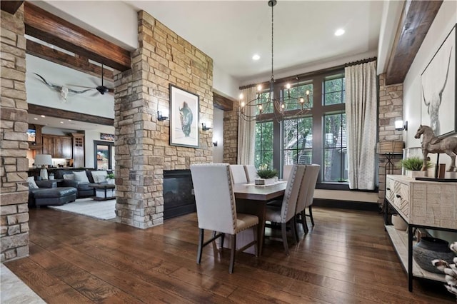 11106 W 146th Ter, Overland Park, KS 66221 - dining area featuring a stone fireplace, hardwood / wood-style floors, a chandelier, a ceiling fan, and recessed lighting