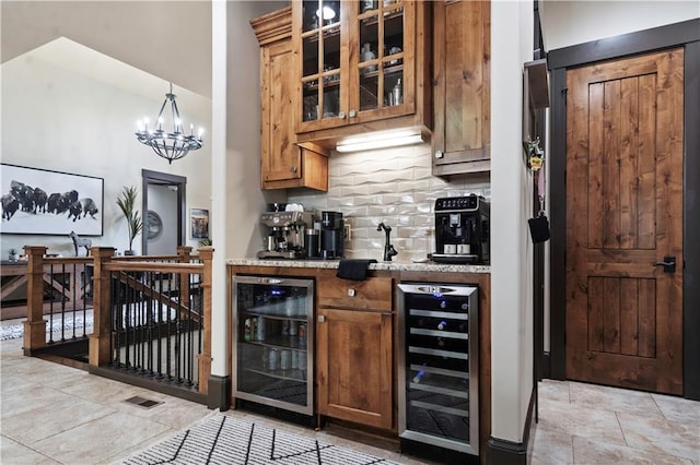 11106 W 146th Ter, Overland Park, KS 66221 - indoor bar with wine cooler, decorative backsplash, and a chandelier