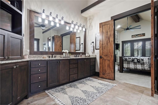 11106 W 146th Ter, Overland Park, KS 66221 - bathroom featuring a ceiling fan and double vanity