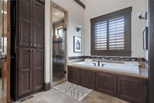 11106 W 146th Ter, Overland Park, KS 66221 - full bathroom featuring a shower stall and a bath