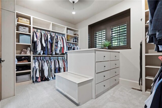 11106 W 146th Ter, Overland Park, KS 66221 - spacious closet featuring carpet floors and a ceiling fan