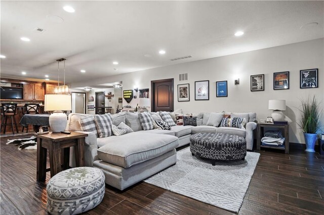 11106 W 146th Ter, Overland Park, KS 66221 - living room with recessed lighting and dark wood-style floors