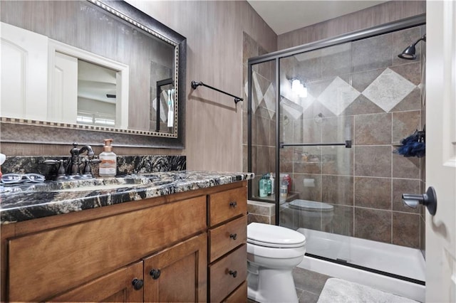 11106 W 146th Ter, Overland Park, KS 66221 - full bathroom with toilet, vanity, a stall shower, and tile patterned flooring