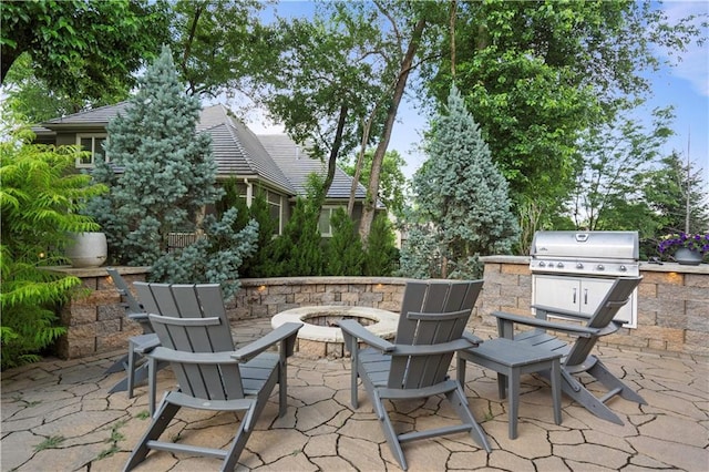 11106 W 146th Ter, Overland Park, KS 66221 - view of patio featuring an outdoor fire pit and grilling area