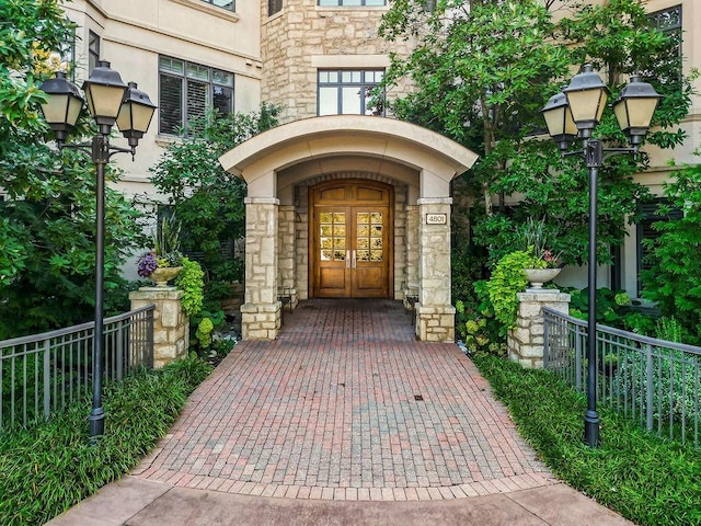 4801 W 133rd St Unit 103, Leawood, KS 66209 - entrance to property with stone siding and french doors