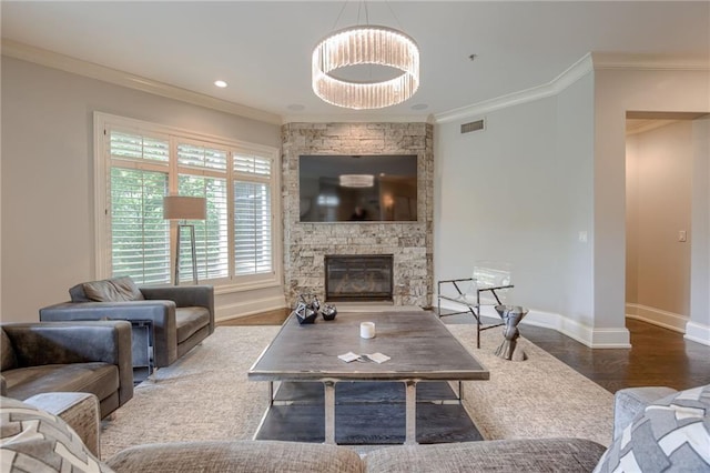 4801 W 133rd St Unit 103, Leawood, KS 66209 - living area with ornamental molding, baseboards, a fireplace, and wood finished floors